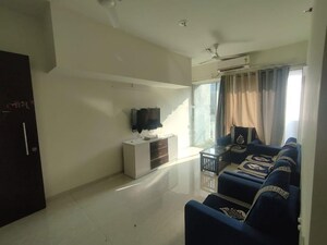 Living Room in 2 BHK Apartment at L And T Seawoods Residences, Seawoods – for Rent