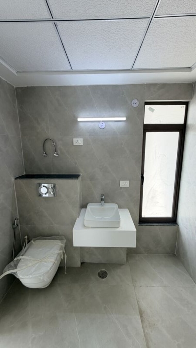 Bathroom, aditya-world-city-residences 3 Bedroom 1980 Sq.Ft. Apartment In Shahpur Bamheta Ghaziabad 10749827