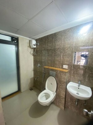 Bathroom in 1 BHK Apartment at Runwal Gardens Phase I, Dombivli East – for Rent