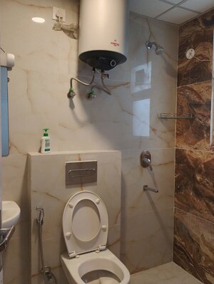 Bathroom in 3 BHK Apartment at Omaxe The Palace, Gomti Nagar – for Sale