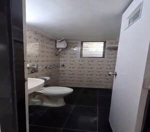 Bathroom in 2 BHK Apartment at Matunga East – for Rent