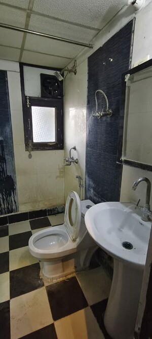 Bathroom in 3 BHK Apartment at Meenal Balmukund Residency, Raj Nagar Extension – for Sale
