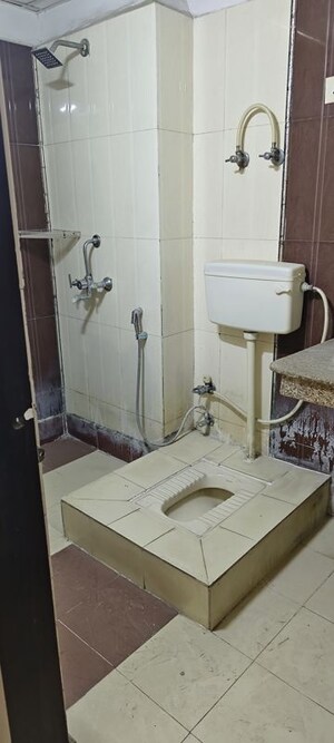 Bathroom in 3 BHK Apartment at Meenal Balmukund Residency, Raj Nagar Extension – for Sale