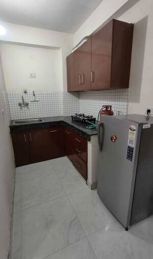 Kitchen in 2 BHK Builder Floor at Ramesh Nagar – for Rent