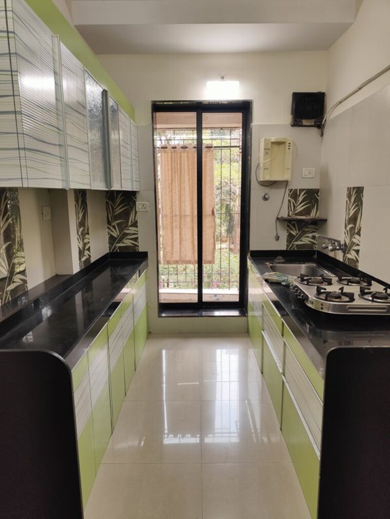 Kitchen, raunak-laxmi-narayan-residency 2 Bedroom 770 Sq.Ft. Apartment In Pokhran Road No Two Thane 10749919