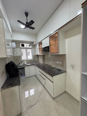Kitchen in 2.5 BHK Apartment at Smart World Gems, Sector 89 – for Rent