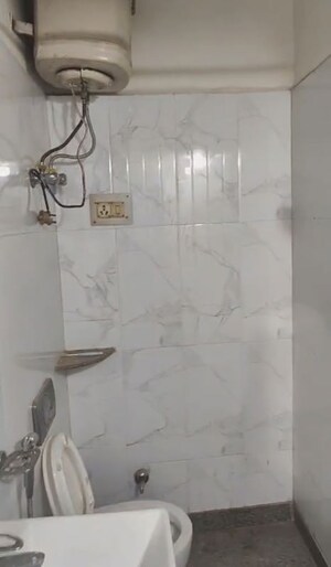 Bathroom in 2 BHK Builder Floor at Rajouri Garden – for Rent