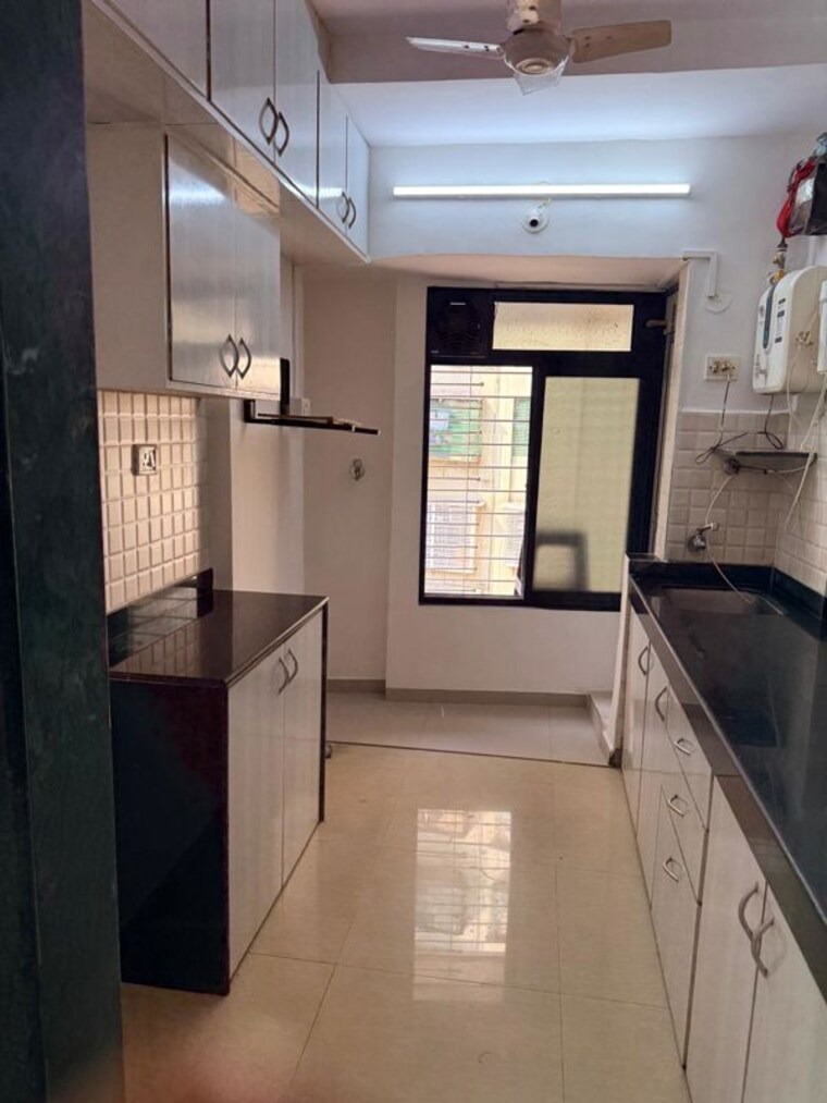 Kitchen, rna-ng-suncity-phase-ii 1 Bedroom 665 Sq.Ft. Apartment In Kandivali East Mumbai 10750008