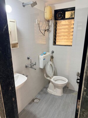 Bathroom in 1 BHK Apartment at RNA NG Suncity Phase II, Kandivali East – for Rent