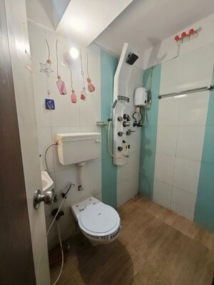 Bathroom in 1 BHK Apartment at M R Galaxy Royale, Goregaon West – for Rent