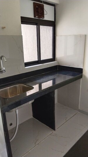 Kitchen in 1 BHK Apartment at Runwal Gardens, Dombivli East – for Rent