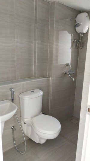 Bathroom in 1 BHK Apartment at Runwal Gardens, Dombivli East – for Rent