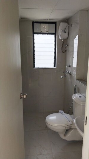 Bathroom in 1 BHK Apartment at Runwal Gardens, Dombivli East – for Rent