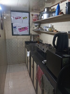 Kitchen in 1 RK Apartment at Om Shree Sadguru CHS, Shree Nagar – for Sale