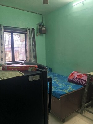 Bedroom in 1 RK Apartment at Om Shree Sadguru CHS, Shree Nagar – for Sale