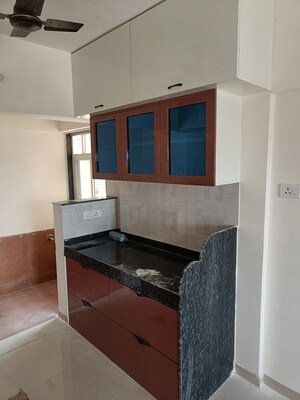 Kitchen in 2 BHK Apartment at The Rao Heights, Moshi – for Rent