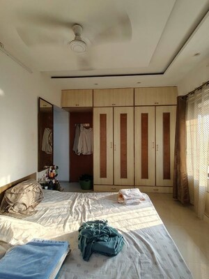 Bedroom in 2 BHK Apartment at Aalind Link Palace CHS, Goregaon East – for Rent