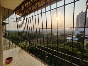 Balcony in 2 BHK Apartment at Aalind Link Palace CHS, Goregaon East – for Rent