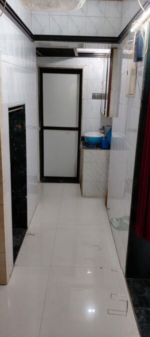 Bathroom in 2 BHK Apartment at Rustomjee Regency, Dahisar West – for Rent