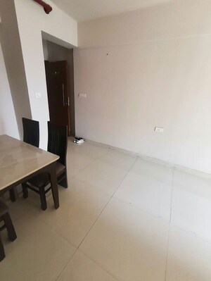Living Room in 2 BHK Apartment at Rustomjee Hazel, Majiwada – for Rent