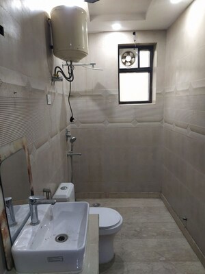 Bathroom in 3 BHK Builder Floor at Paschim Vihar – for Sale