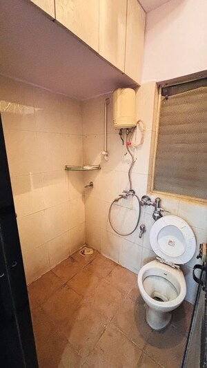 Bathroom in 2 BHK Apartment at Marathon Cosmos, Mulund West – for Rent