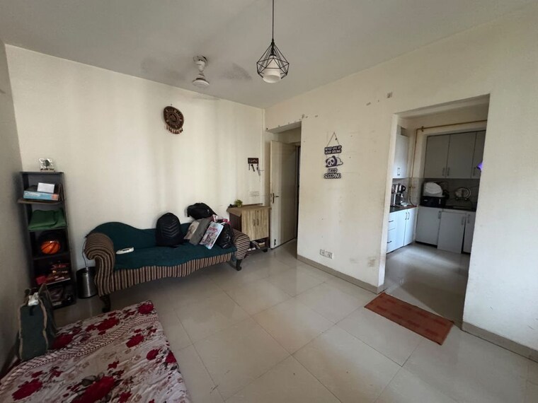 Living Room, jaypee-greens-kosmos 2 Bedroom 850 Sq.Ft. Apartment In Sector 134 Noida 10750275