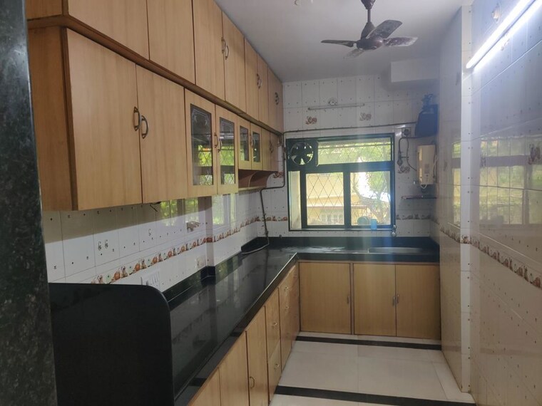 Kitchen, bhudargarh colony 2 Bedroom 700 Sq.Ft. Apartment In Bhudargarh Colony Mumbai 10750098