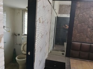 Bathroom in 2 BHK Apartment at Ganeshwadi – for Rent