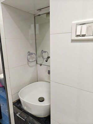 Bathroom in 3 BHK Apartment at Rashmi Regency, Nalasopara East – for Rent