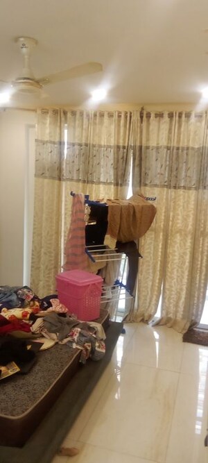 Living Room in 2 BHK Apartment at Parker White Lily, Sector 8 – for Rent