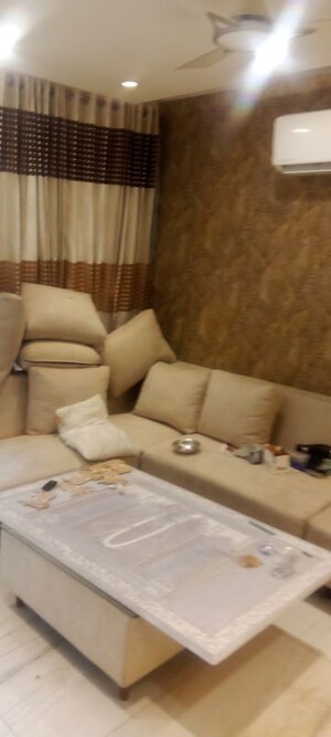 Living Room in 2 BHK Apartment at Parker White Lily, Sector 8 – for Rent
