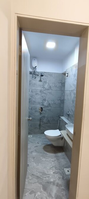 Bathroom in 2 BHK Apartment at Raunak Unnathi Woods Supreme, Ghodbunder Road – for Rent
