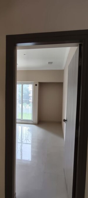 Building Lobby in 2 BHK Apartment at Raunak Unnathi Woods Supreme, Ghodbunder Road – for Rent