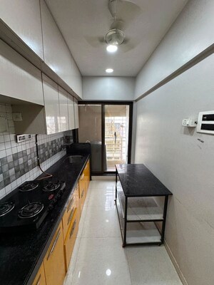 Kitchen in 2 BHK Apartment at JP Rishabh Tower Azad Nagar, Andheri West – for Rent