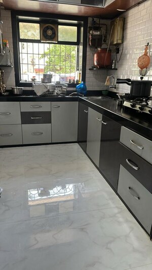 Kitchen in 2 BHK Apartment at Andheri CHS, Andheri West – for Rent