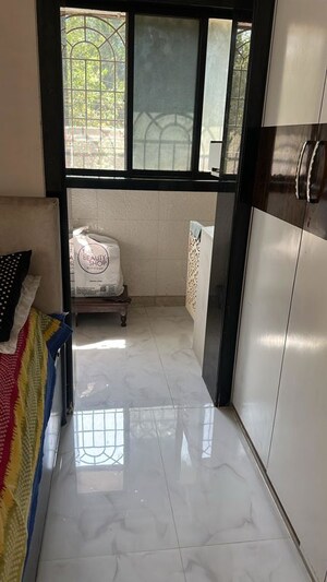 Kitchen in 2 BHK Apartment at Andheri CHS, Andheri West – for Rent