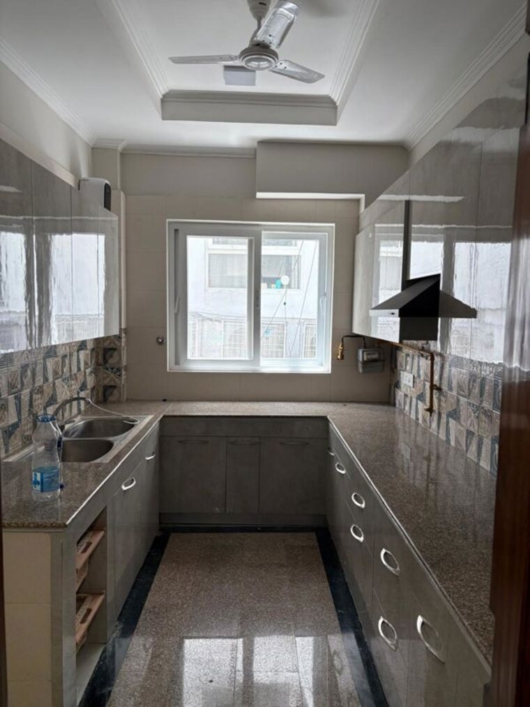 Kitchen, uday park 3 Bedroom 217 Sq.Yd. Builder Floor In Uday Park Delhi 10750435