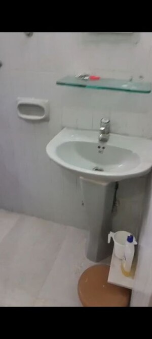 Bathroom in 2 BHK Apartment at Andheri CHS, Andheri West – for Rent
