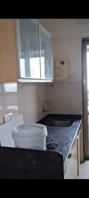 Bathroom in 2 BHK Apartment at Shree Sai D N Nagar Dwarka CHS, Andheri West – for Rent