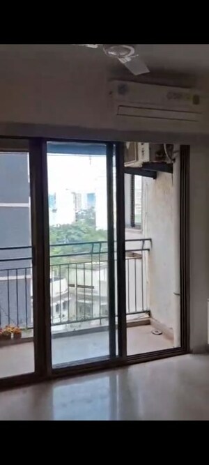 Room in 2 BHK Apartment at Shree Sai D N Nagar Dwarka CHS, Andheri West – for Rent