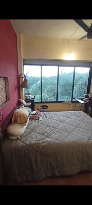 Bedroom in 2 BHK Apartment at Andheri CHS, Andheri West – for Rent