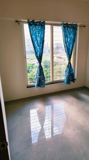 Bedroom in 2 BHK Apartment at Adhya Radhakrishna, Moshi – for Rent
