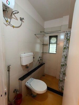 Bathroom in 1.5 BHK Apartment at Urmila CHS Dhankawadi, Dhankawadi – for Rent