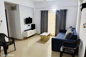 Living Room in 1.5 BHK Apartment at Dheeraj Jade Residences, Wagholi – for Rent