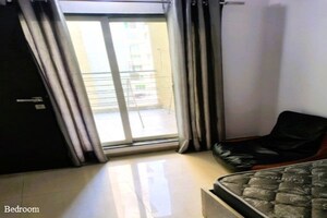 Bedroom in 1.5 BHK Apartment at Dheeraj Jade Residences, Wagholi – for Rent