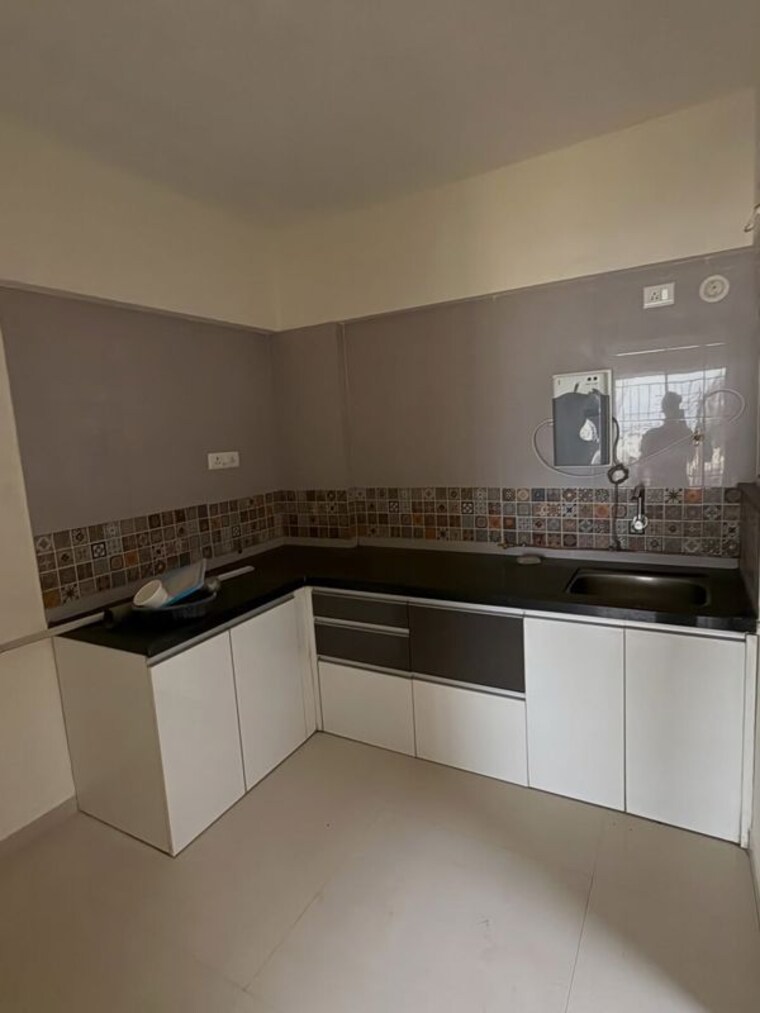 Kitchen, choice-goodwill-valencia 1.5 Bedroom 520 Sq.Ft. Apartment In Dhanori Pune 10750635