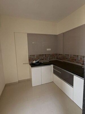 Kitchen in 1.5 BHK Apartment at Choice Goodwill Valencia, Dhanori – for Sale