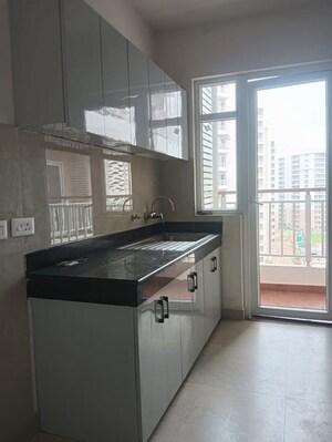 Kitchen in 3 BHK Apartment at Rishita Mulberry Heights, Sushant Golf City – for Sale