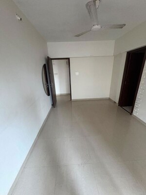 Room in 2 BHK Apartment at Oshiwara – for Rent